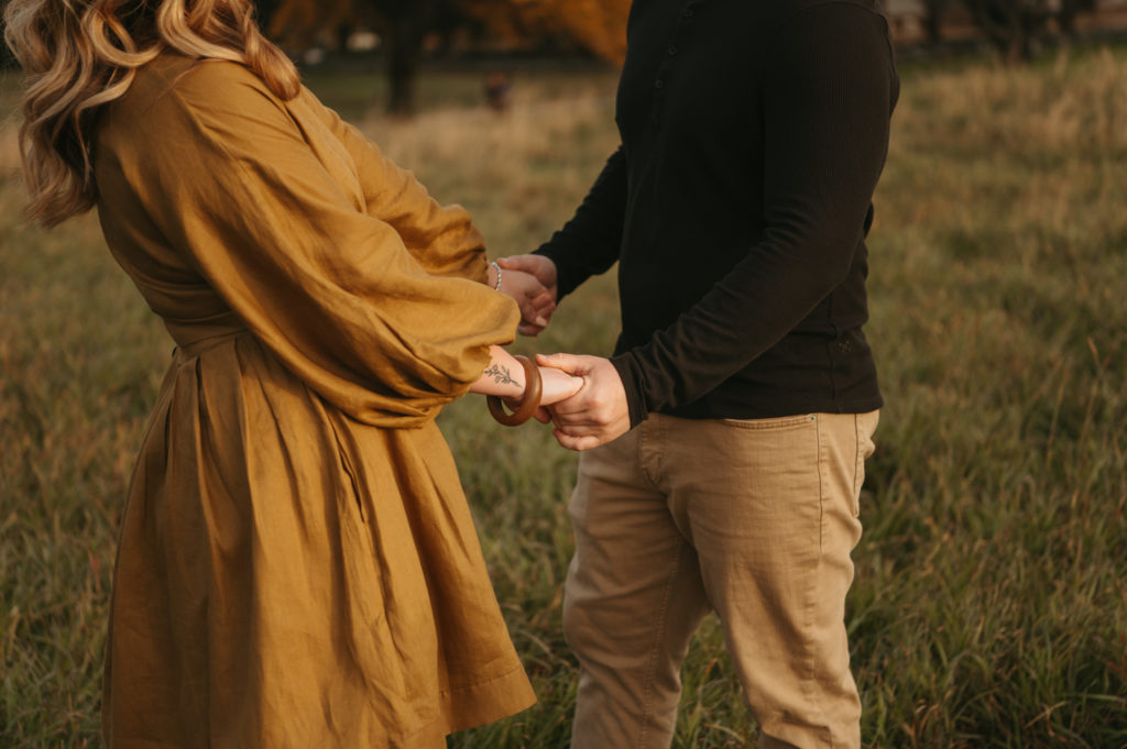 Litchfield fall engagement couple holding hands